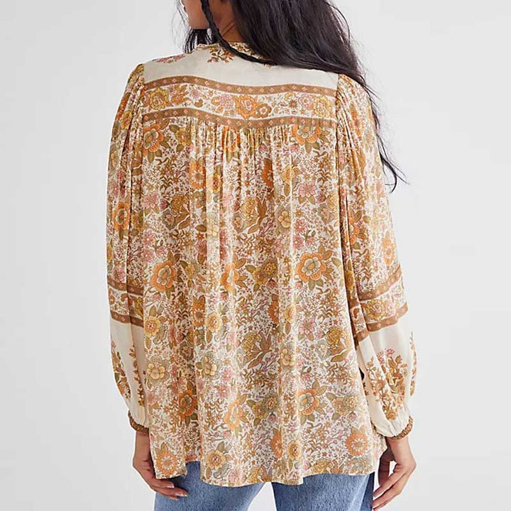 Blusa Folgada Floral com Botões e Mangas Compridas