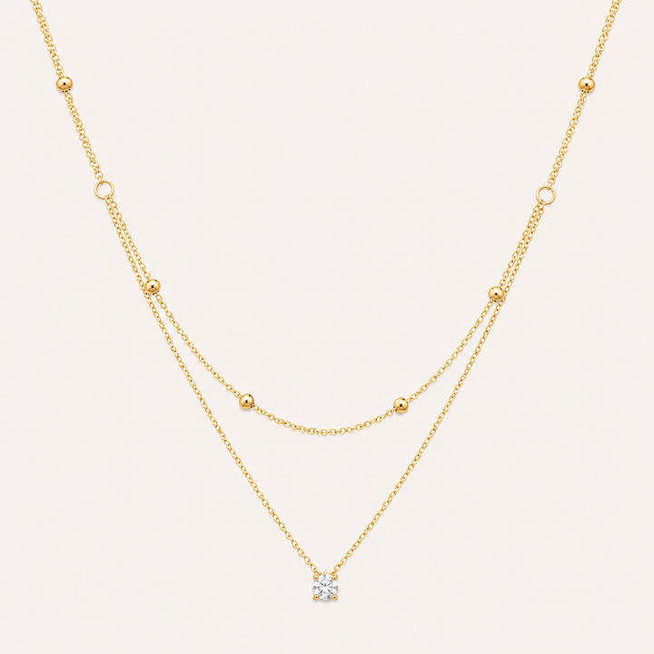 Duet Luxe — Dupla Camada com Pendente Dourado