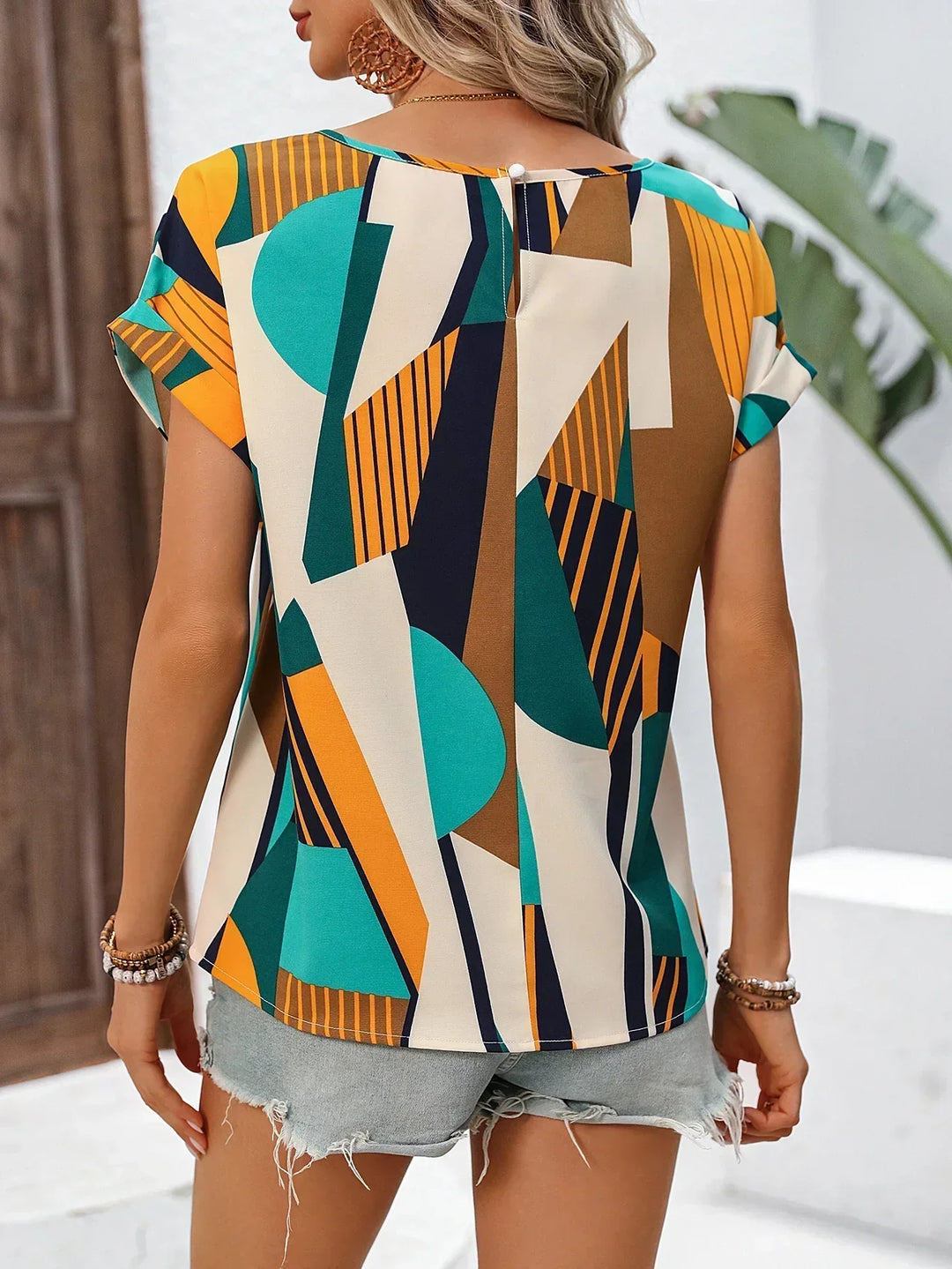 Blusa de Manga Curta com Estampado Geométrico e Corte Folgado
