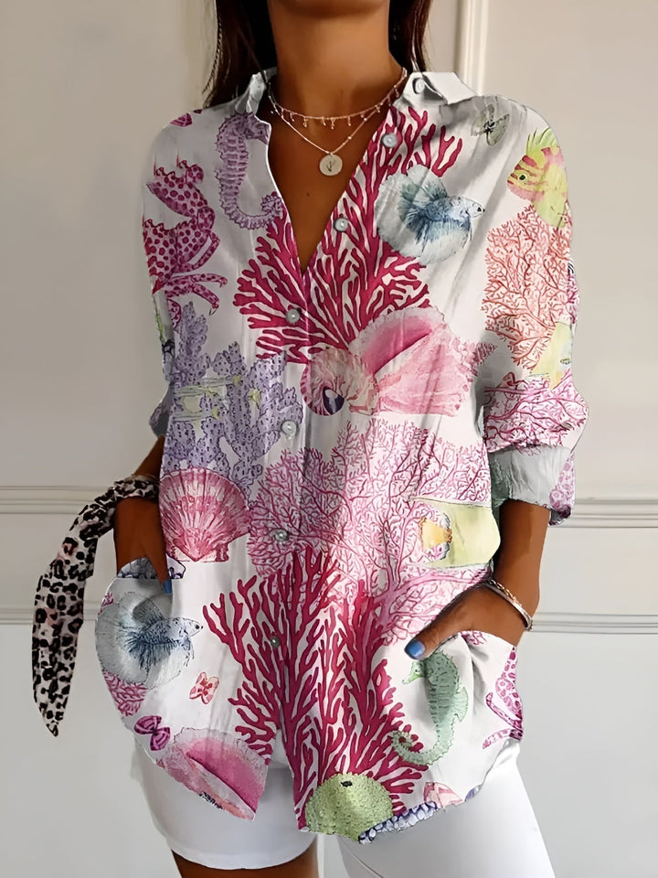 Blusa Floral Abotoada com Mangas Compridas e Corte Folgado