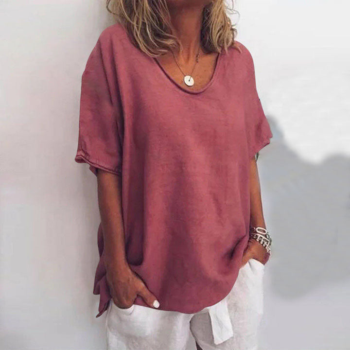 Blusa Folgada com Decote Redondo e Mangas Enroladas