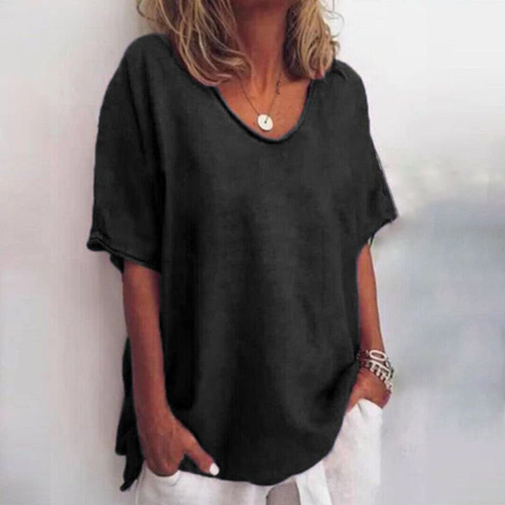 Blusa Folgada com Decote Redondo e Mangas Enroladas